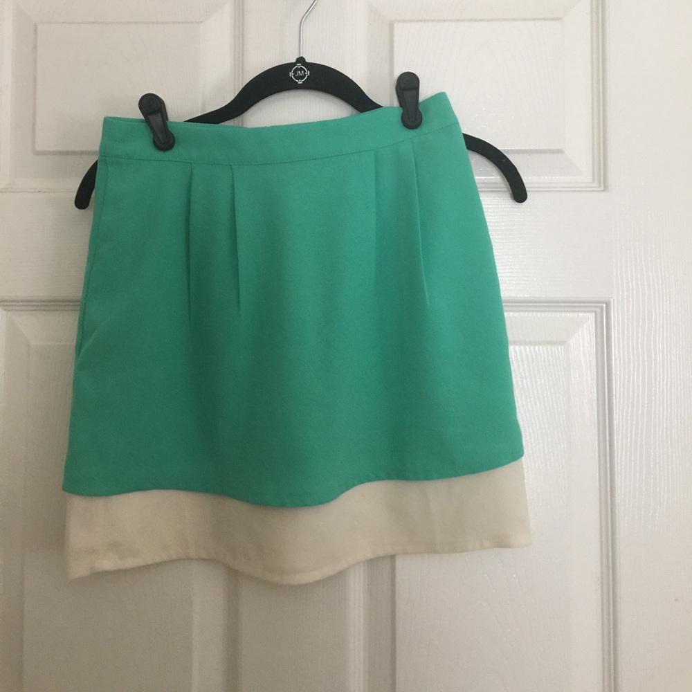 Green and ivory mini skirt